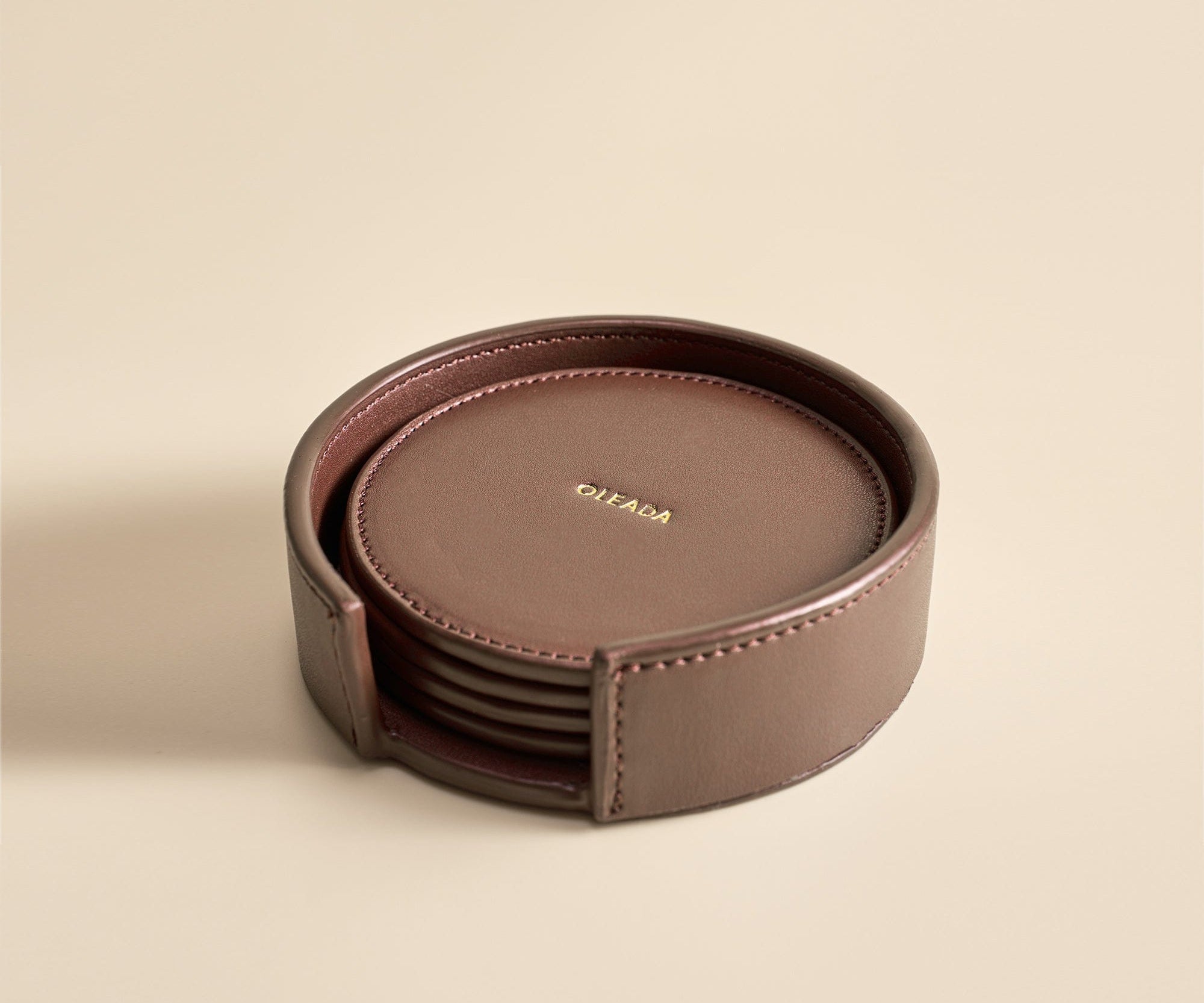 OLEADA NYC Apparel and Accessories > Women > Small Leather Goods > Leather Cardholder Color_Chocolate Sip N Stay Coasters (Set of 4)