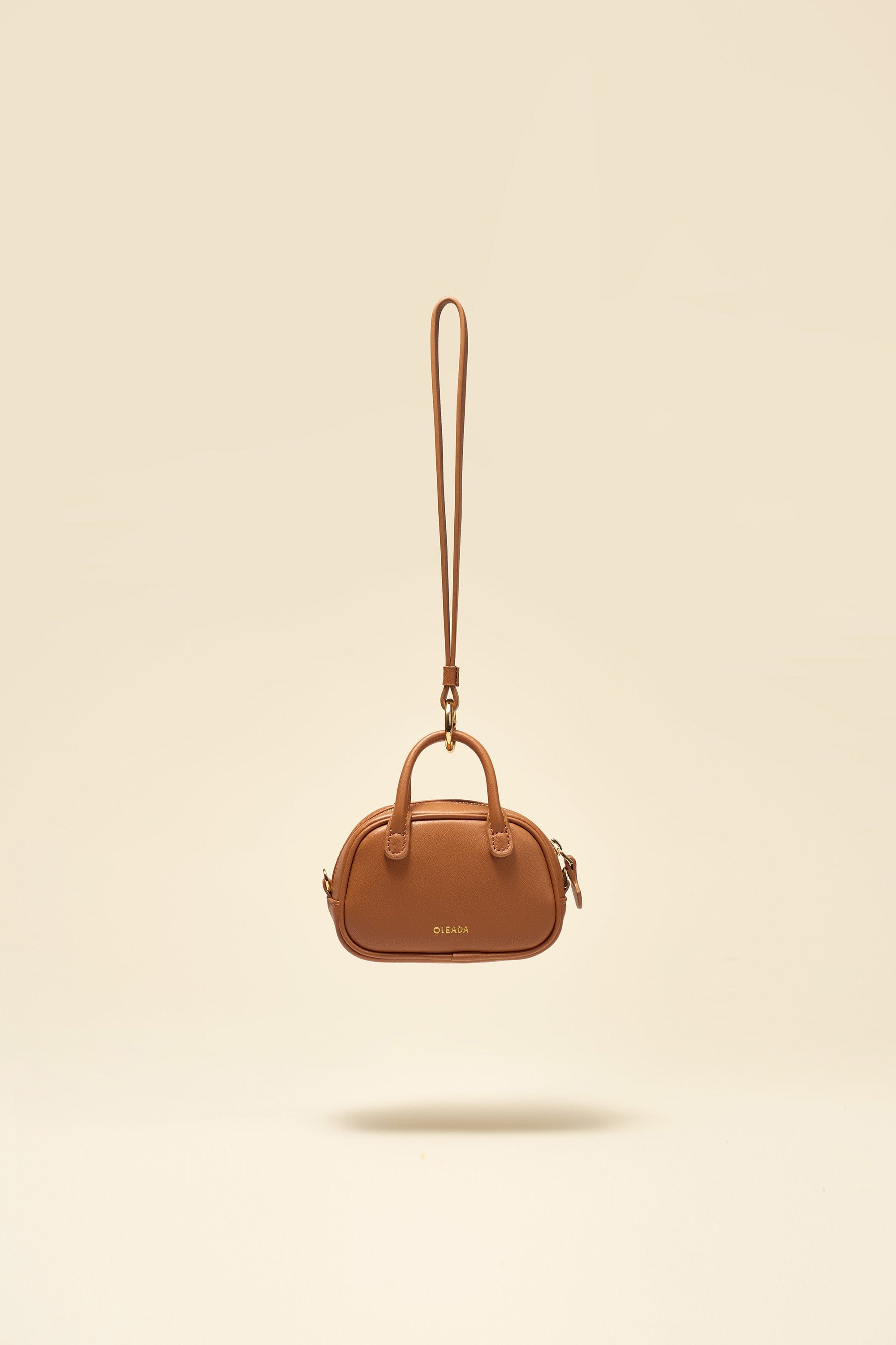 OLEADA NYC Apparel and Accessories > Women > Small Leather Goods > Leather Case Color_Chestnut Marina Carryall Charm