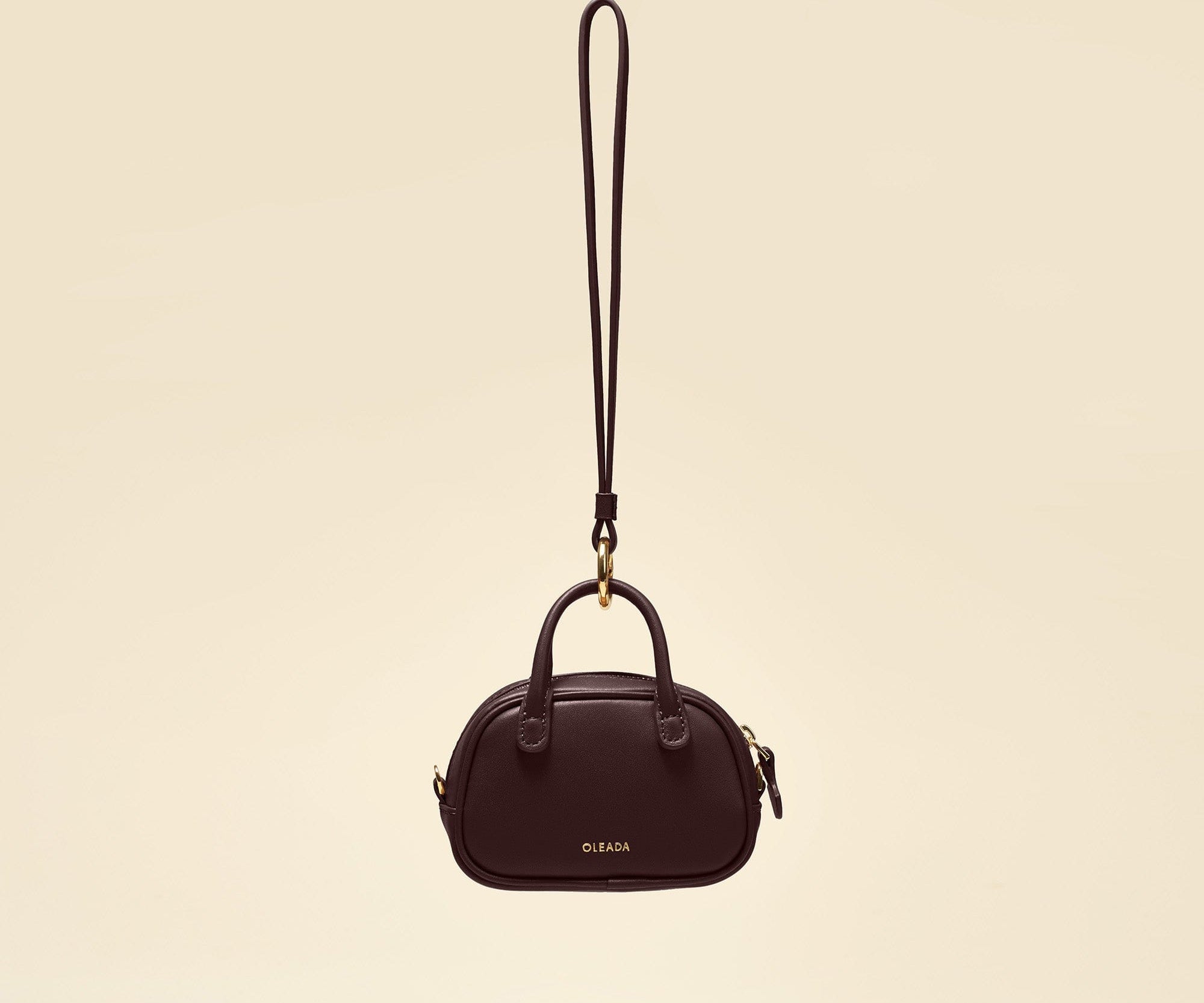 OLEADA NYC Apparel and Accessories > Women > Small Leather Goods > Leather Case Color_Chocolate Marina Carryall Charm