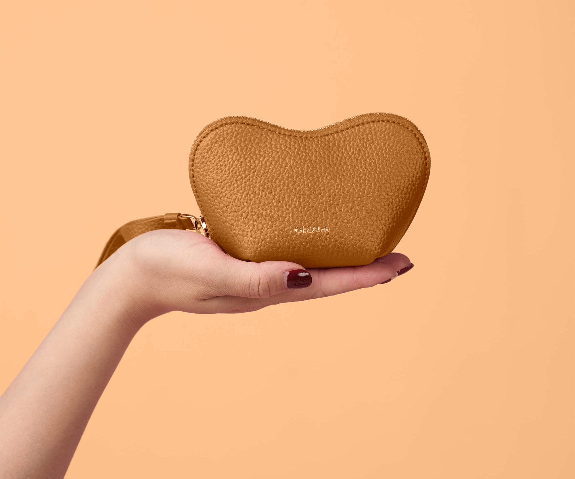 OLEADA NYC Apparel and Accessories > Women > Small Leather Goods > Leather Case Color_Honey Mini Le Coeur Pouch