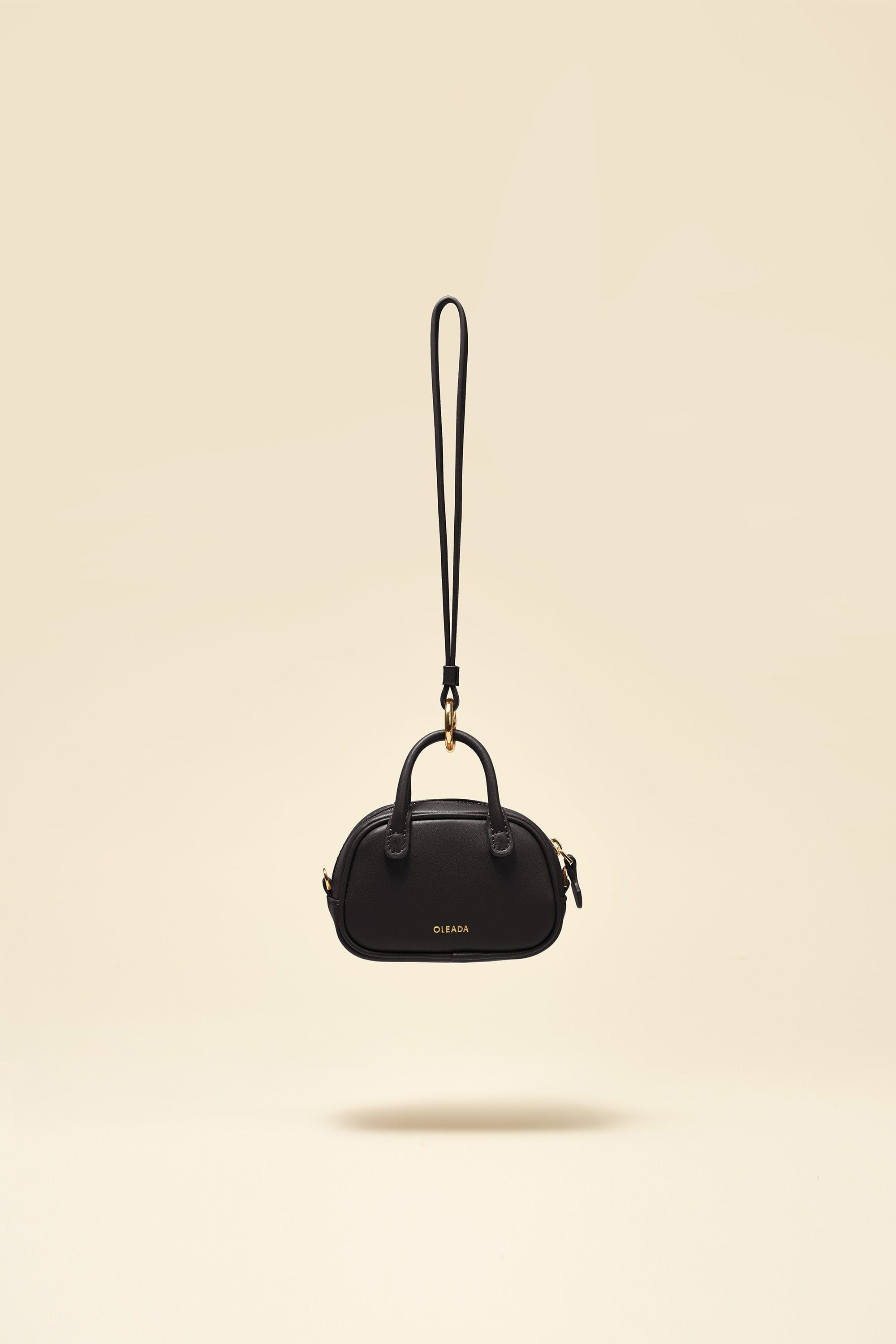 OLEADA NYC Apparel and Accessories > Women > Small Leather Goods > Leather Case Color_Onyx Marina Carryall Charm