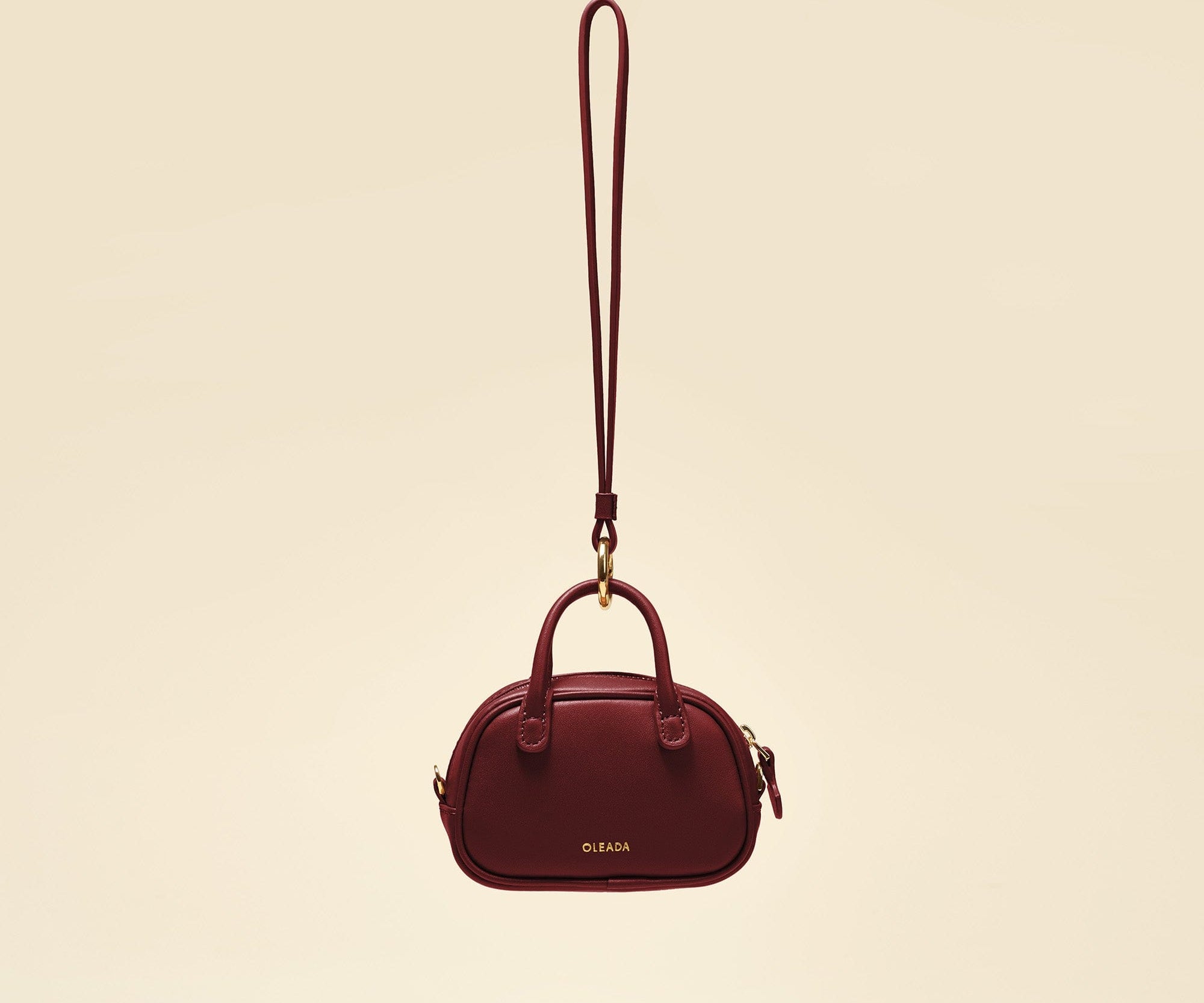 OLEADA NYC Apparel and Accessories > Women > Small Leather Goods > Leather Case Color_Scarlet Marina Carryall Charm