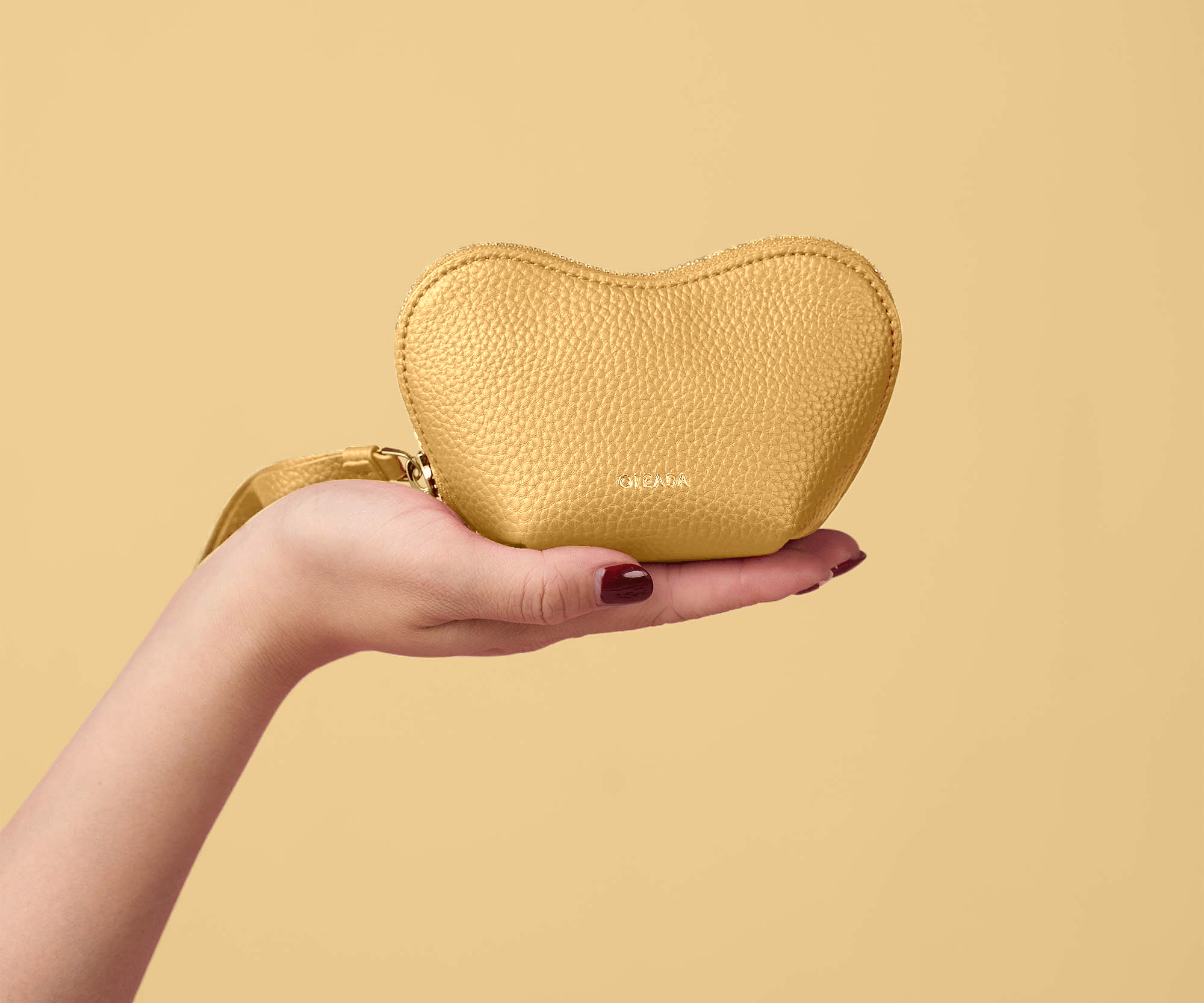 OLEADA NYC Apparel and Accessories > Women > Small Leather Goods > Leather Case Color_Yolk Mini Le Coeur Pouch