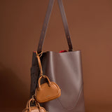 OLEADA NYC Apparel and Accessories > Women > Small Leather Goods > Leather Case Marina Carryall Charm