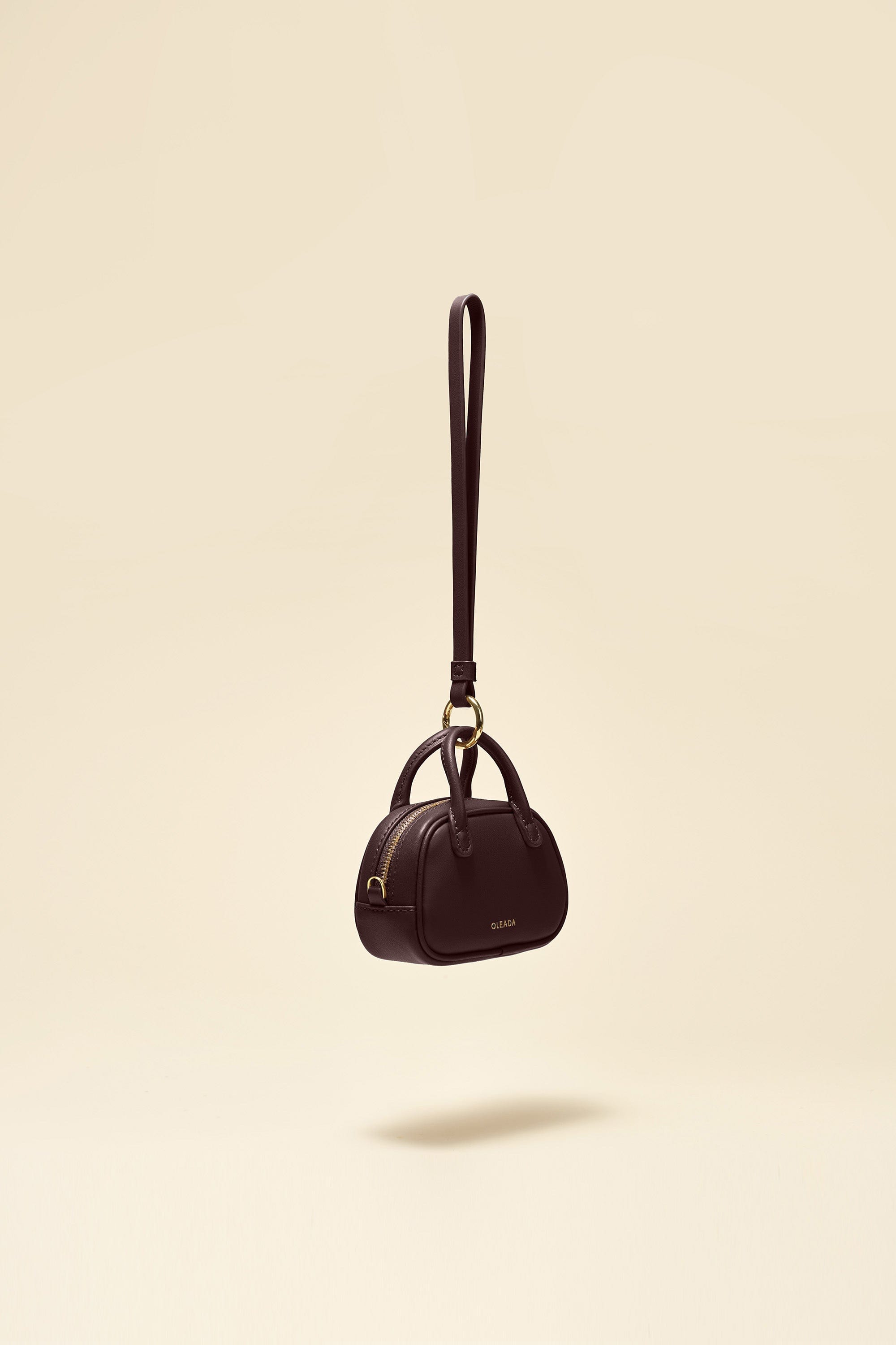 OLEADA NYC Apparel and Accessories > Women > Small Leather Goods > Leather Case Marina Carryall Charm