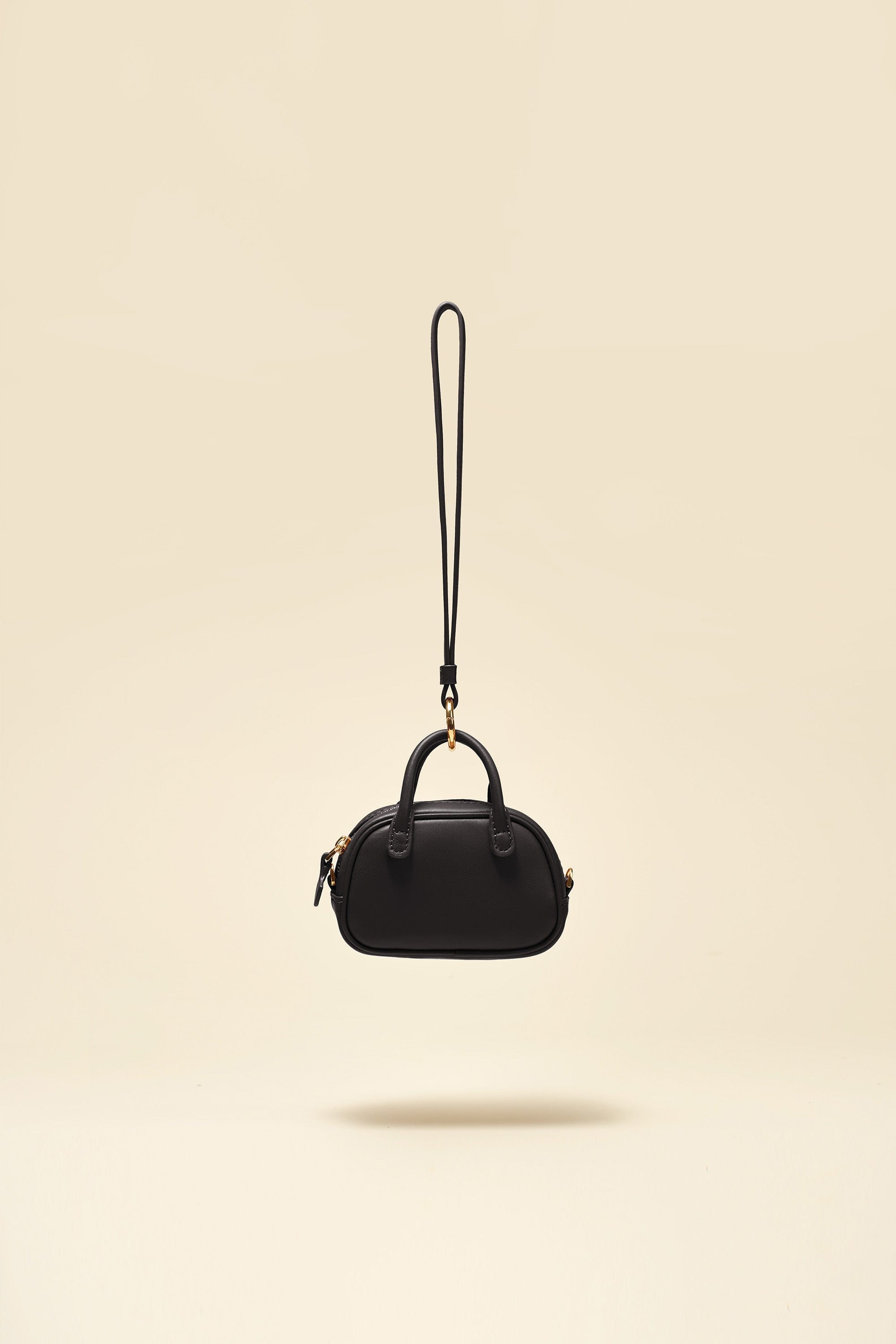 OLEADA NYC Apparel and Accessories > Women > Small Leather Goods > Leather Case Marina Carryall Charm