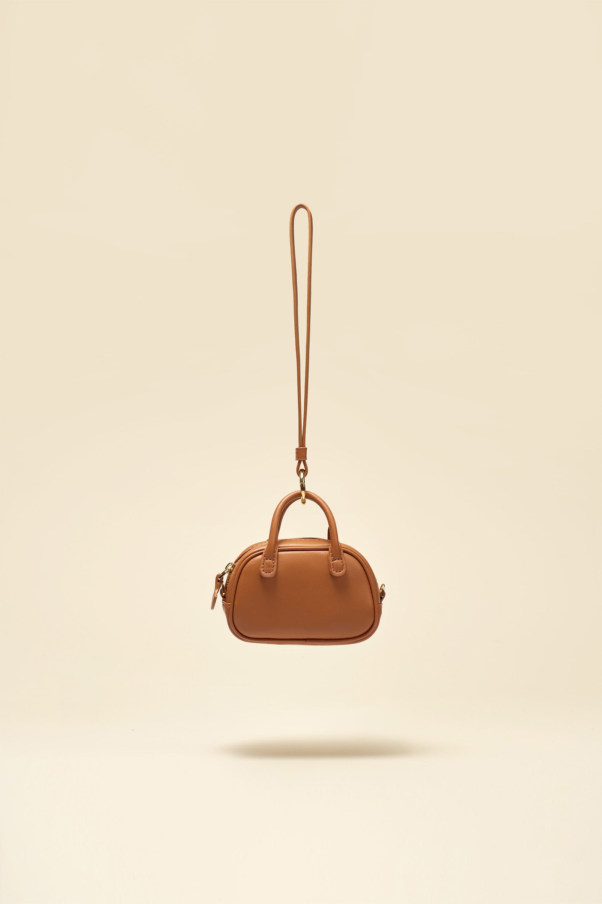 OLEADA NYC Apparel and Accessories > Women > Small Leather Goods > Leather Case Marina Carryall Charm