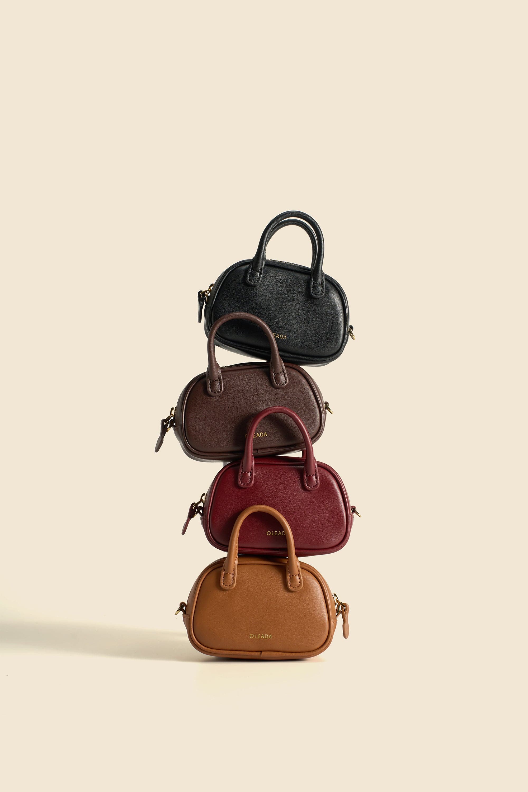 OLEADA NYC Apparel and Accessories > Women > Small Leather Goods > Leather Case Marina Carryall Charm