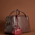 OLEADA NYC Apparel and Accessories > Women > Small Leather Goods > Leather Case Marina Carryall Charm
