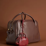 OLEADA NYC Apparel and Accessories > Women > Small Leather Goods > Leather Case Marina Carryall Charm