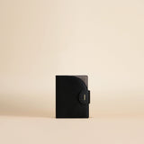 OLEADA NYC Apparel and Accessories > Women > Small Leather Goods > Leather Passport Holder Color_Caviar Jet-set Passport Holder