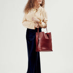 OLEADA NYC Bucket Bag > Leather Tote Bag For Women > Large Capacity Handbag > Convertible To Shoulder Bag > stylish 14 inch laptop bag Marina Soft Bucket