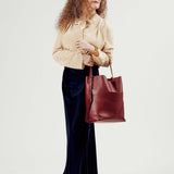 OLEADA NYC Bucket Bag > Leather Tote Bag For Women > Large Capacity Handbag > Convertible To Shoulder Bag > stylish 14 inch laptop bag Marina Soft Bucket