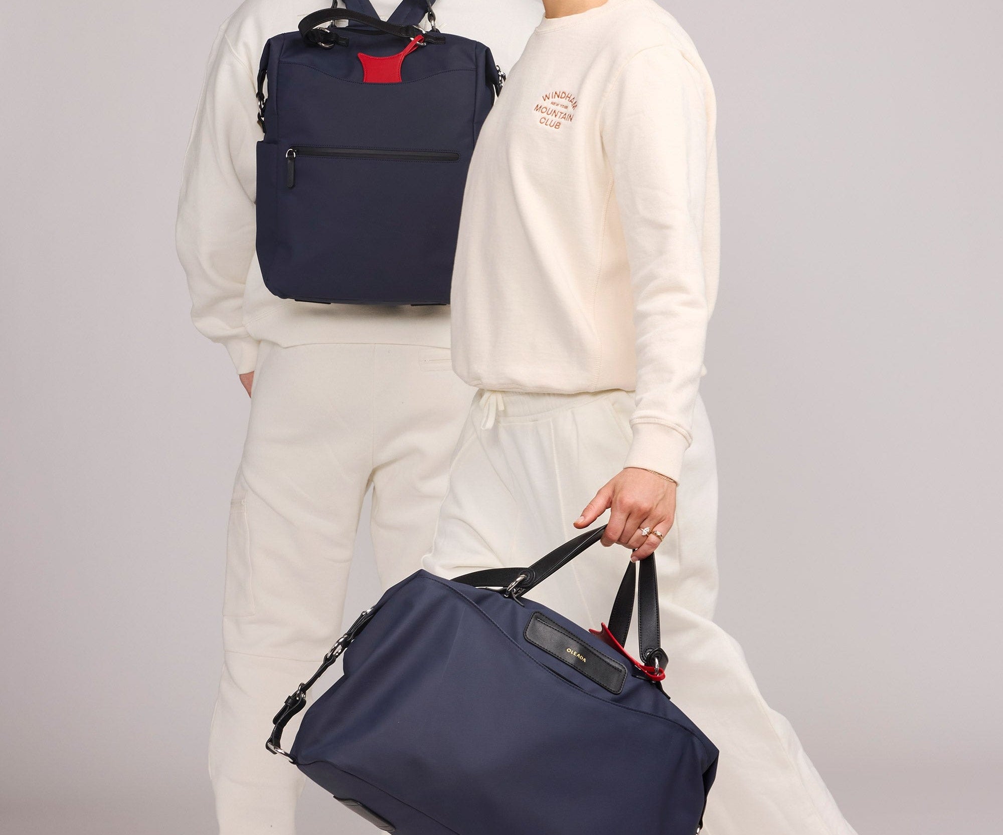 OLEADA NYC convertible travel bags > airport tote bags > overnight bags > water-resistant vegan bags > stylish multi-use bags AnyWear AnyDuffle