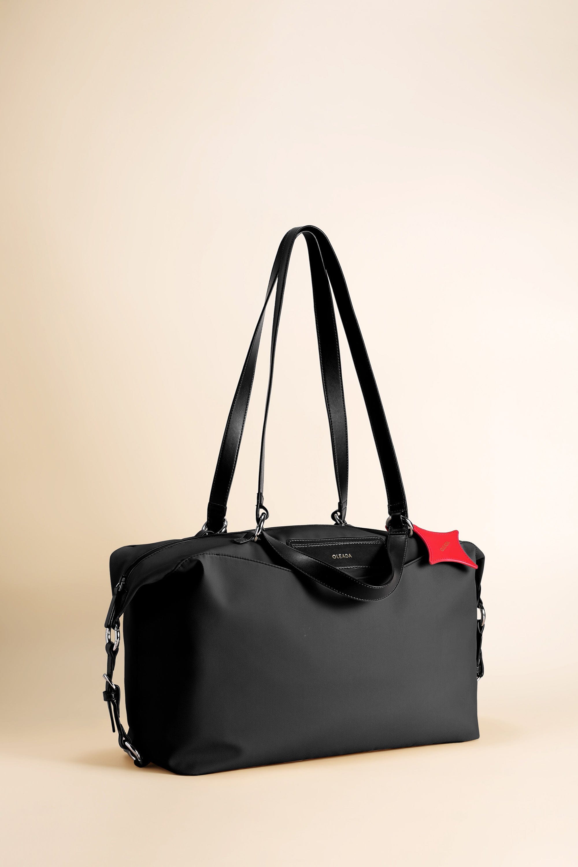 OLEADA NYC convertible travel bags > airport tote bags > overnight bags > water-resistant vegan bags > stylish multi-use bags AnyWear AnyDuffle