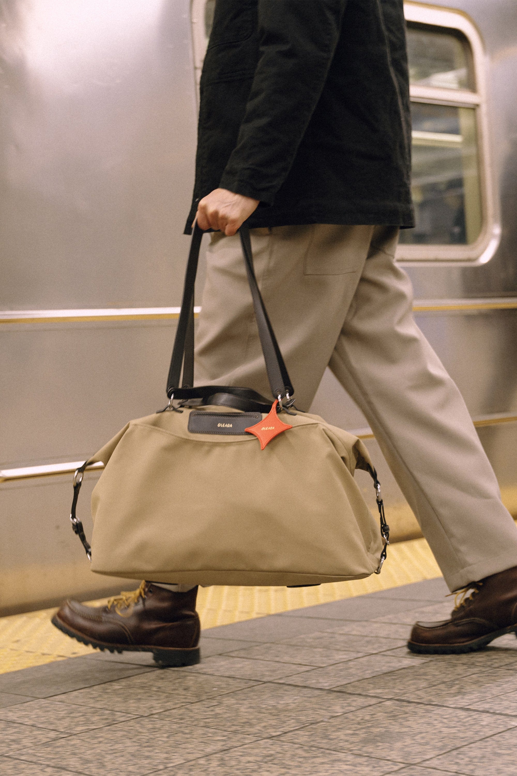 OLEADA NYC convertible travel bags > airport tote bags > overnight bags > water-resistant vegan bags > stylish multi-use bags AnyWear AnyDuffle