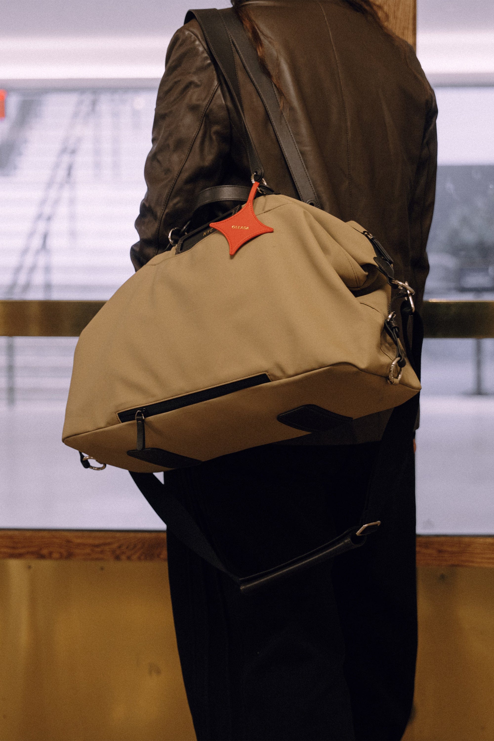 OLEADA NYC convertible travel bags > airport tote bags > overnight bags > water-resistant vegan bags > stylish multi-use bags AnyWear AnyDuffle