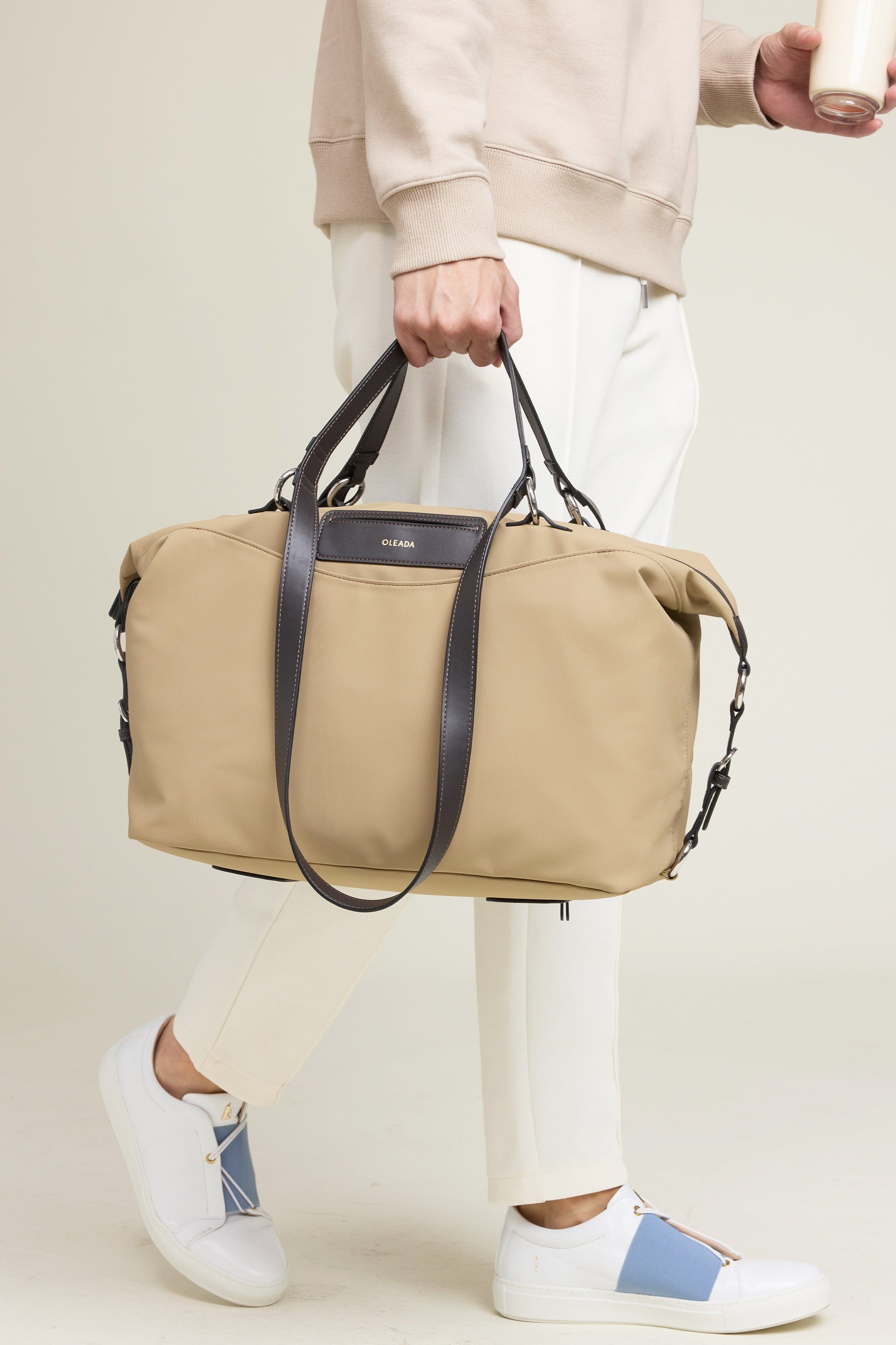 OLEADA NYC convertible travel bags > airport tote bags > overnight bags > water-resistant vegan bags > stylish multi-use bags AnyWear AnyDuffle