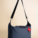 OLEADA NYC convertible travel bags > airport tote bags > overnight bags > water-resistant vegan bags > stylish multi-use bags AnyWear AnyDuffle