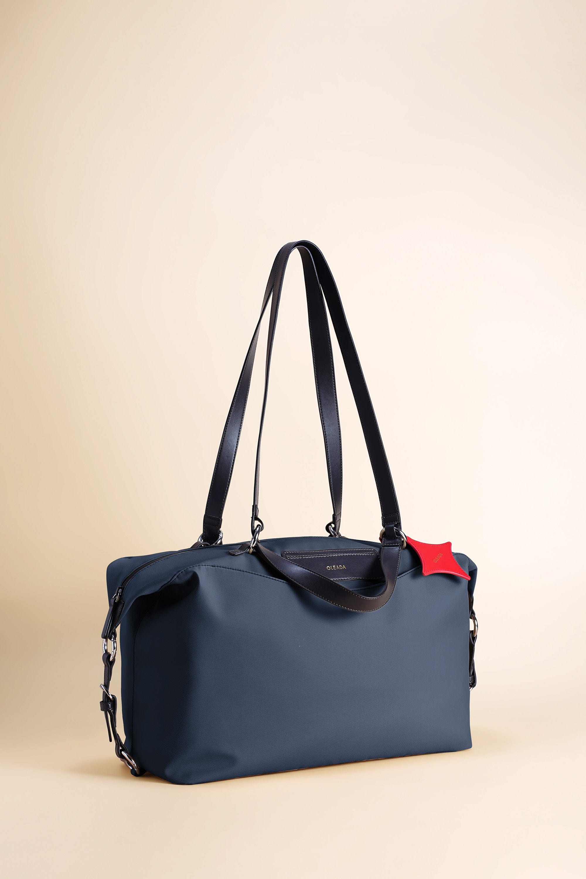 OLEADA NYC convertible travel bags > airport tote bags > overnight bags > water-resistant vegan bags > stylish multi-use bags AnyWear AnyDuffle