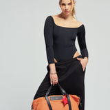 OLEADA NYC convertible travel bags > airport tote bags > overnight bags > water-resistant vegan bags > stylish multi-use bags AnyWear AnyDuffle