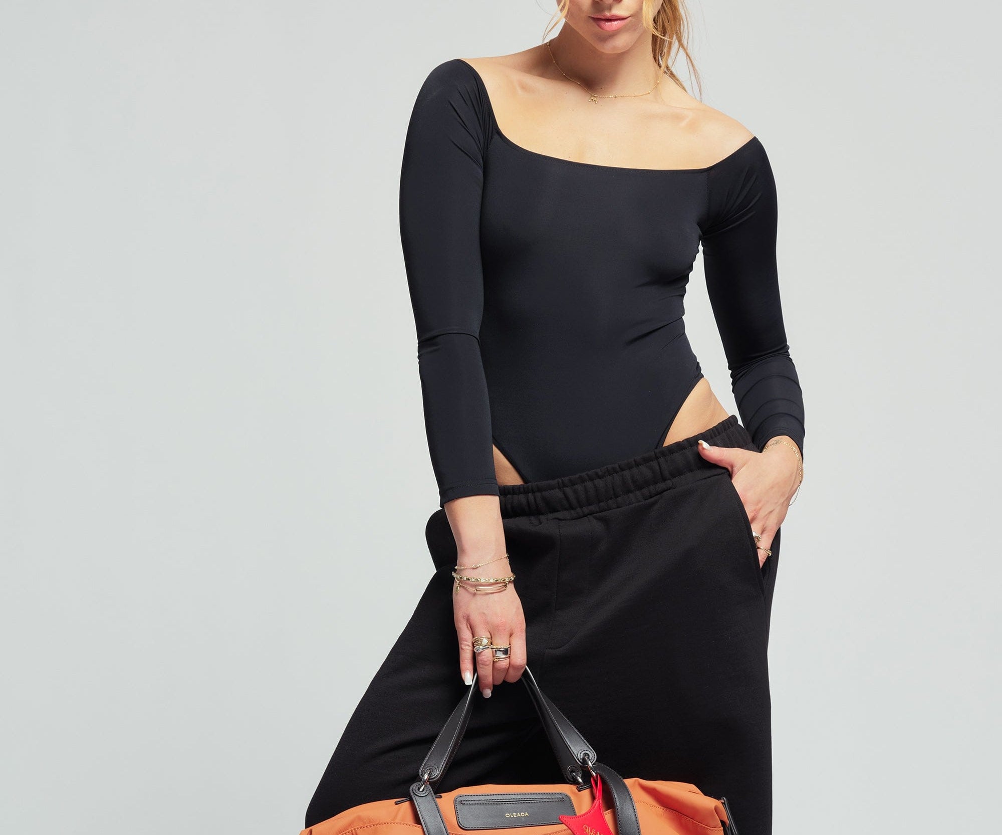 OLEADA NYC convertible travel bags > airport tote bags > overnight bags > water-resistant vegan bags > stylish multi-use bags AnyWear AnyDuffle