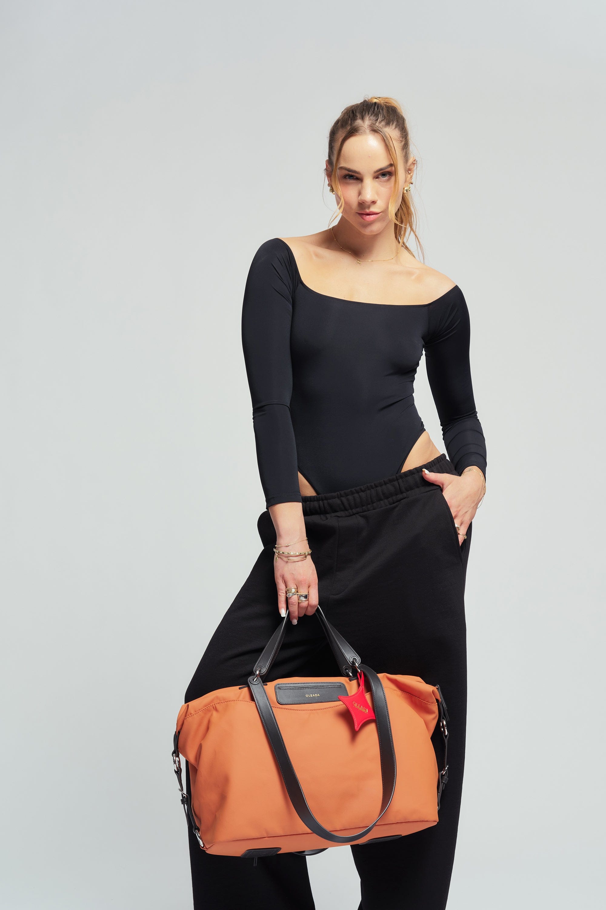 OLEADA NYC convertible travel bags > airport tote bags > overnight bags > water-resistant vegan bags > stylish multi-use bags AnyWear AnyDuffle