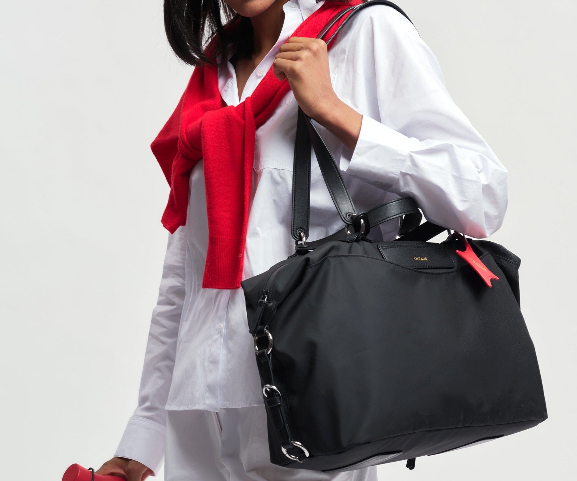 OLEADA NYC convertible travel bags > airport tote bags > overnight bags > water-resistant vegan bags > stylish multi-use bags AnyWear AnyDuffle