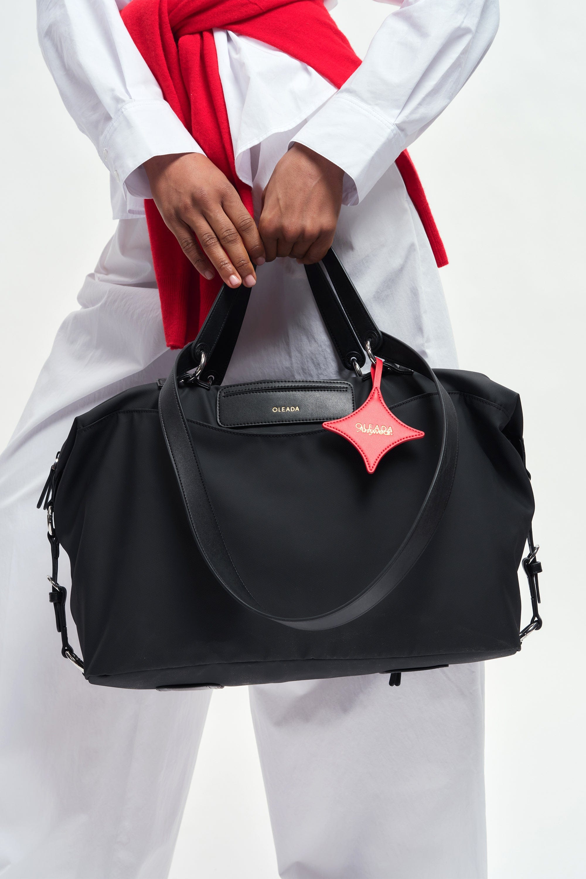 OLEADA NYC convertible travel bags > airport tote bags > overnight bags > water-resistant vegan bags > stylish multi-use bags AnyWear AnyDuffle