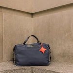 OLEADA NYC convertible travel bags > airport tote bags > overnight bags > water-resistant vegan bags > stylish multi-use bags AnyWear AnyDuffle City