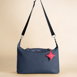 OLEADA NYC convertible travel bags > airport tote bags > overnight bags > water-resistant vegan bags > stylish multi-use bags AnyWear AnyDuffle City