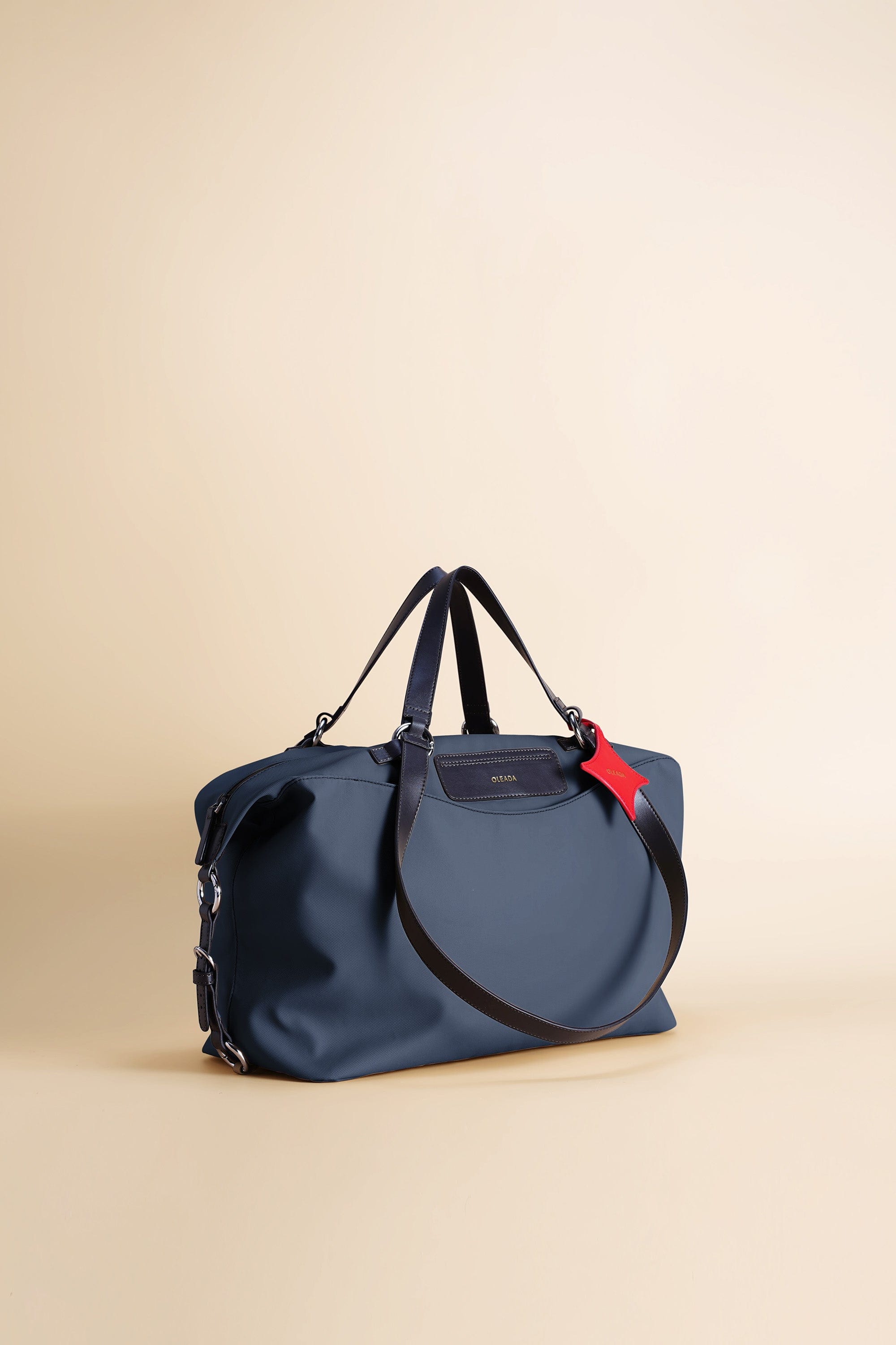 OLEADA NYC convertible travel bags > airport tote bags > overnight bags > water-resistant vegan bags > stylish multi-use bags AnyWear AnyDuffle City