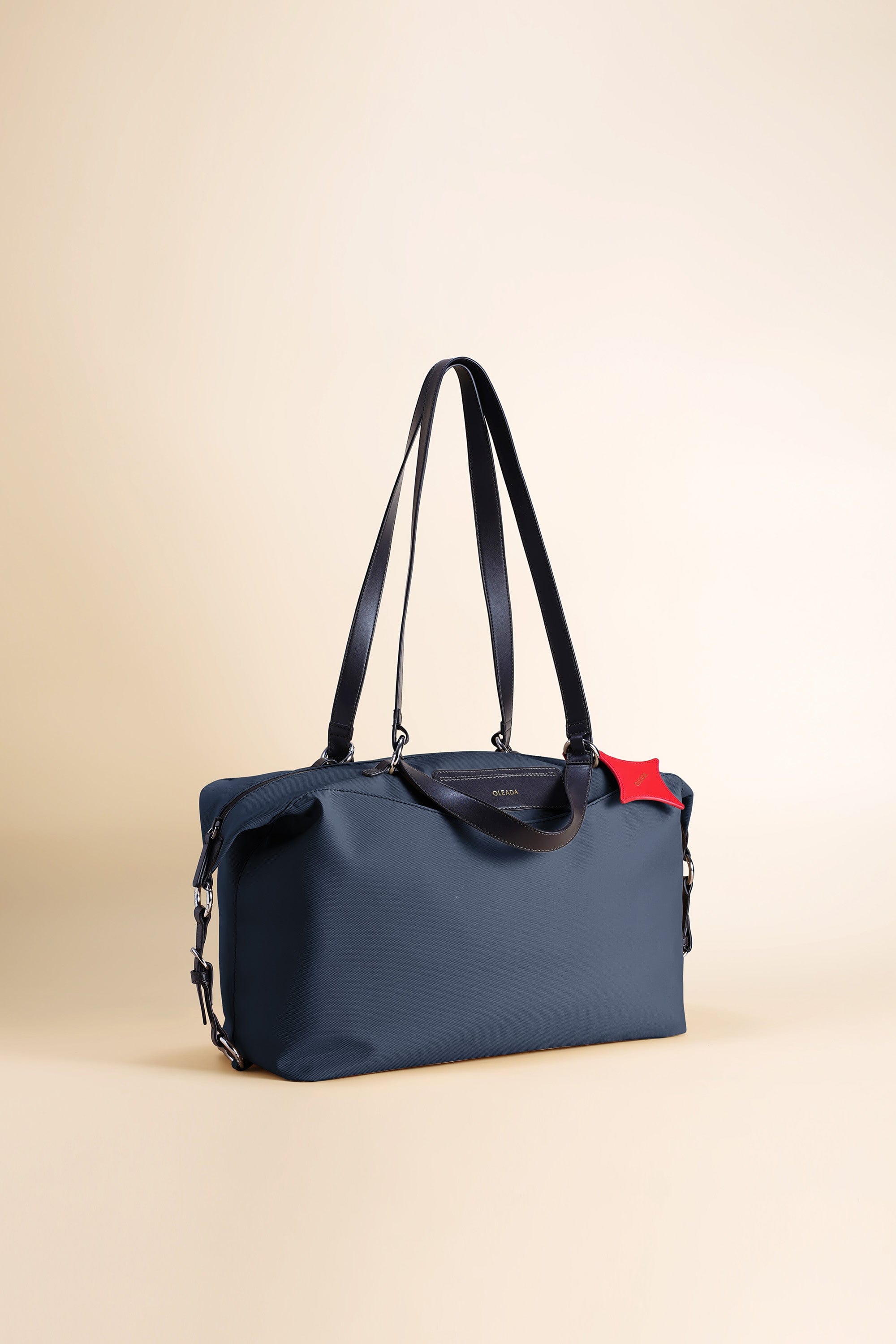 OLEADA NYC convertible travel bags > airport tote bags > overnight bags > water-resistant vegan bags > stylish multi-use bags AnyWear AnyDuffle City