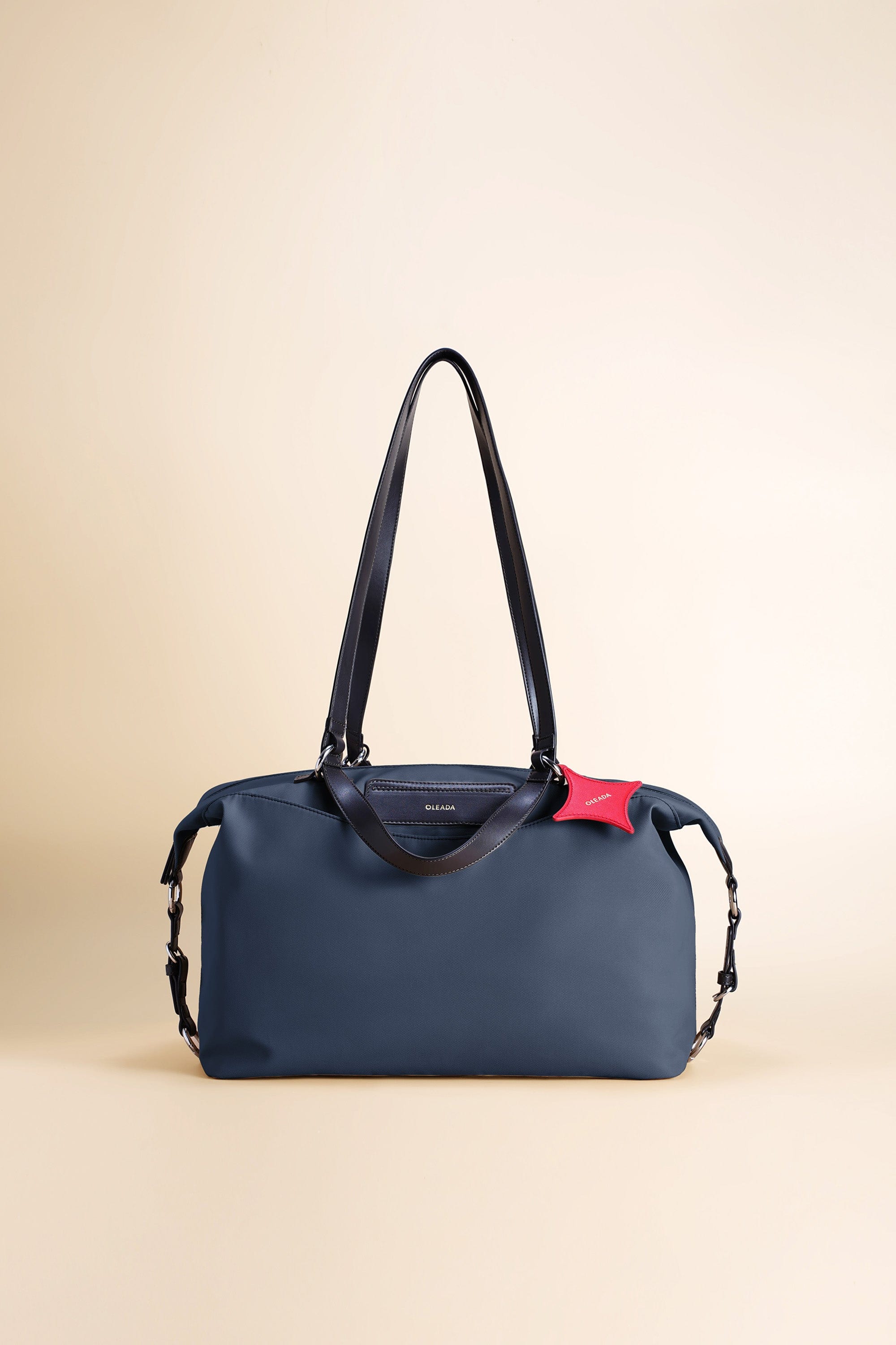 OLEADA NYC convertible travel bags > airport tote bags > overnight bags > water-resistant vegan bags > stylish multi-use bags AnyWear AnyDuffle City