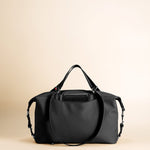 OLEADA NYC convertible travel bags > airport tote bags > overnight bags > water-resistant vegan bags > stylish multi-use bags AnyWear AnyDuffle City