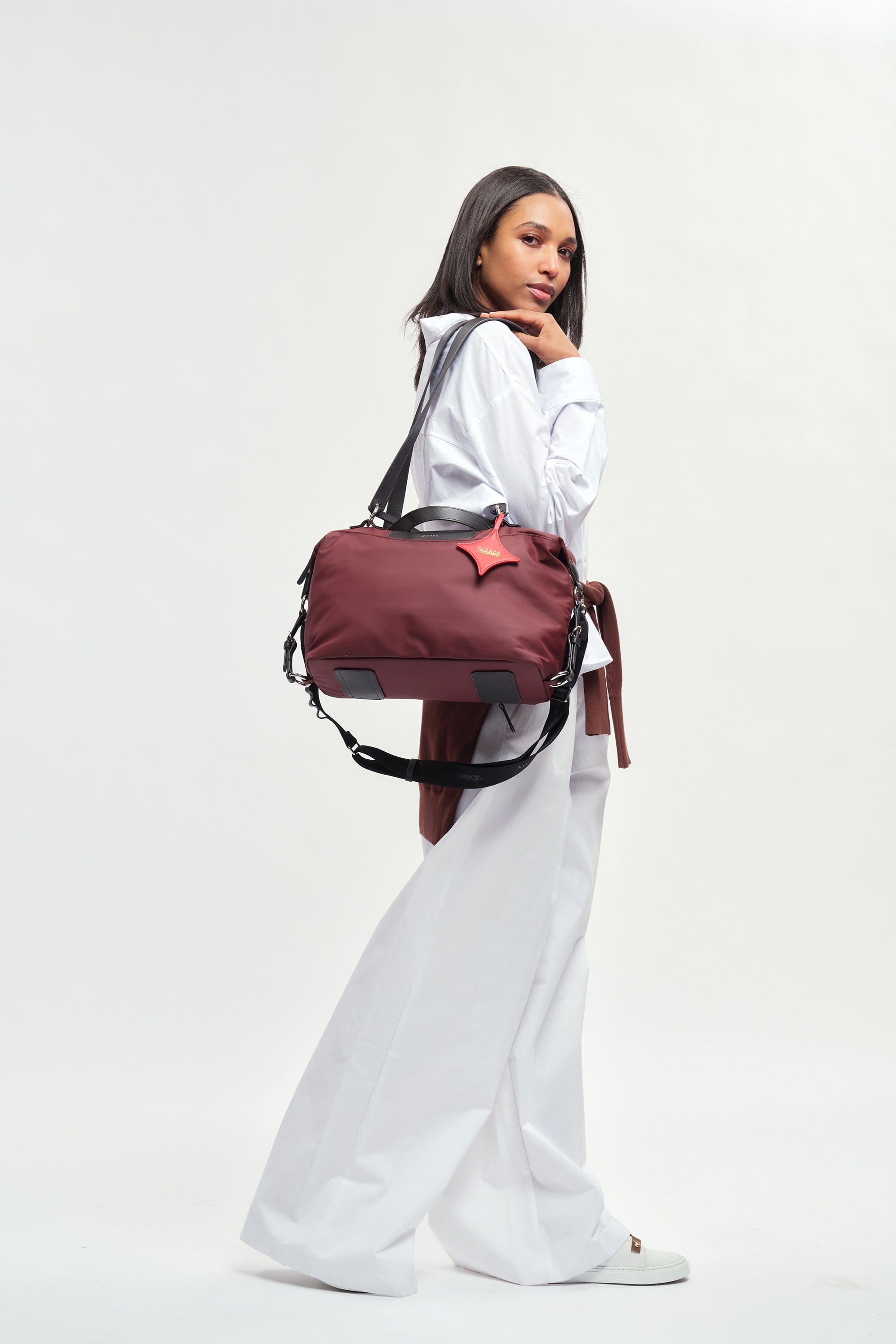 OLEADA NYC convertible travel bags > airport tote bags > overnight bags > water-resistant vegan bags > stylish multi-use bags AnyWear AnyDuffle City