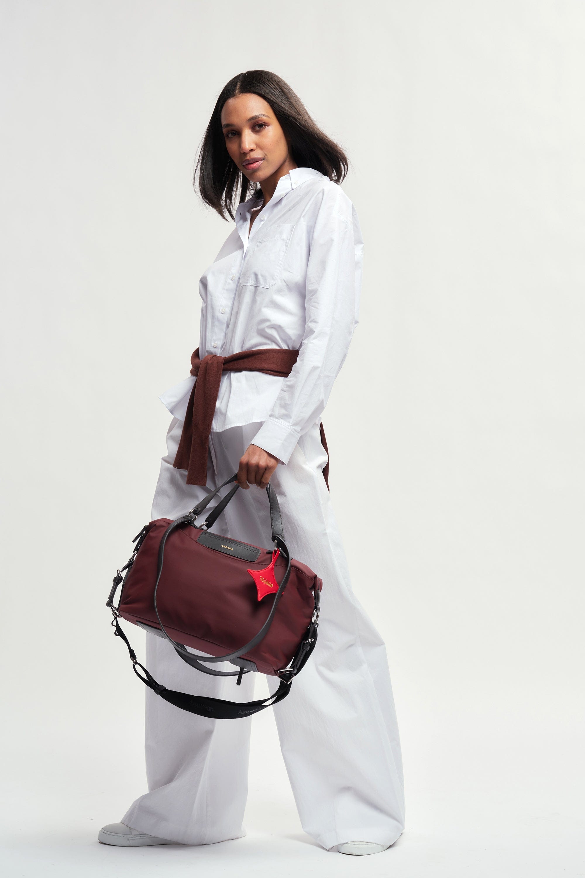 OLEADA NYC convertible travel bags > airport tote bags > overnight bags > water-resistant vegan bags > stylish multi-use bags AnyWear AnyDuffle City