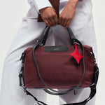OLEADA NYC convertible travel bags > airport tote bags > overnight bags > water-resistant vegan bags > stylish multi-use bags AnyWear AnyDuffle City
