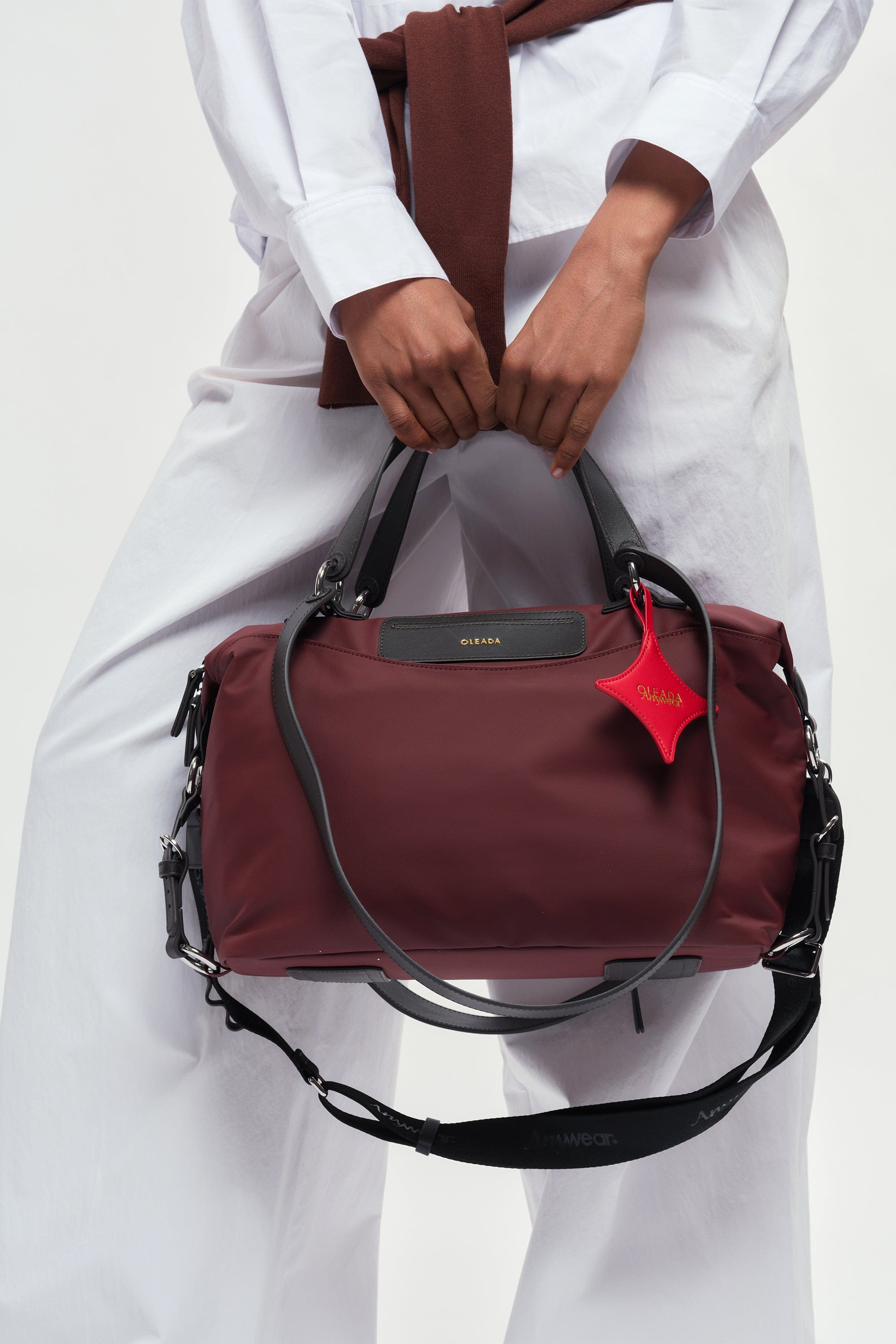 OLEADA NYC convertible travel bags > airport tote bags > overnight bags > water-resistant vegan bags > stylish multi-use bags AnyWear AnyDuffle City