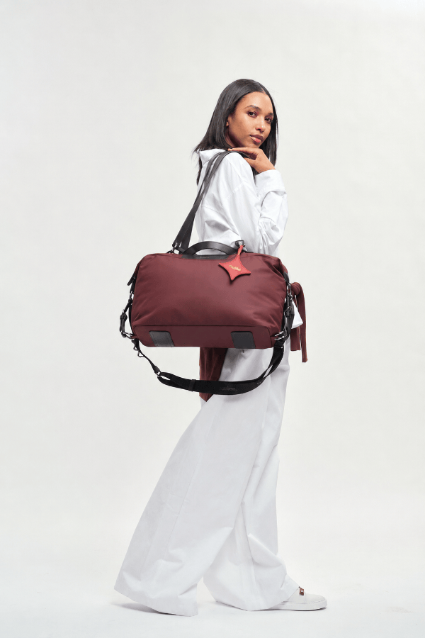 OLEADA NYC convertible travel bags > airport tote bags > overnight bags > water-resistant vegan bags > stylish multi-use bags AnyWear AnyDuffle - Regular Size