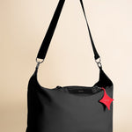 OLEADA NYC convertible travel bags > airport tote bags > overnight bags > water-resistant vegan bags > stylish multi-use bags AnyWear AnyDuffle Travel