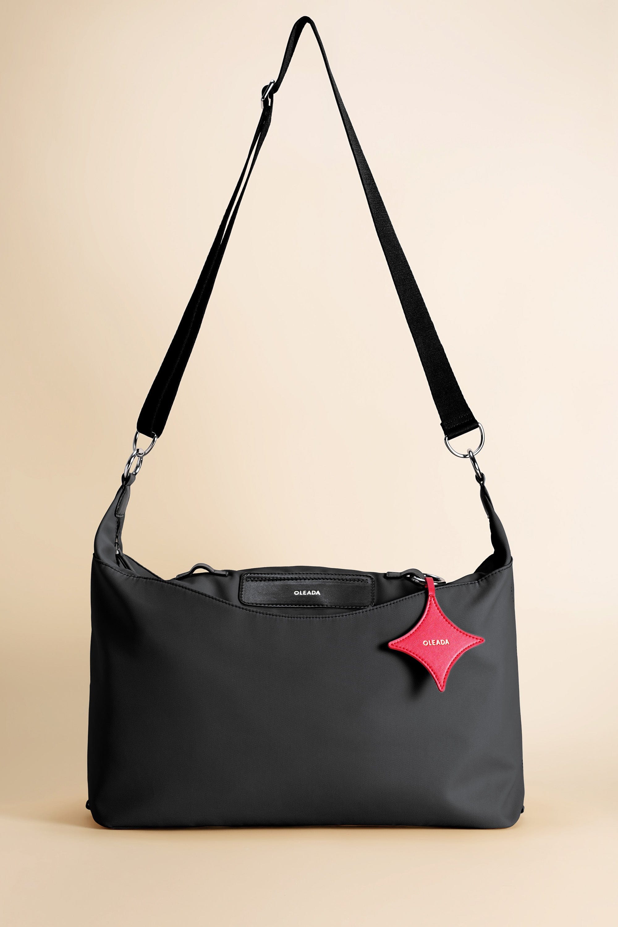 OLEADA NYC convertible travel bags > airport tote bags > overnight bags > water-resistant vegan bags > stylish multi-use bags AnyWear AnyDuffle Travel