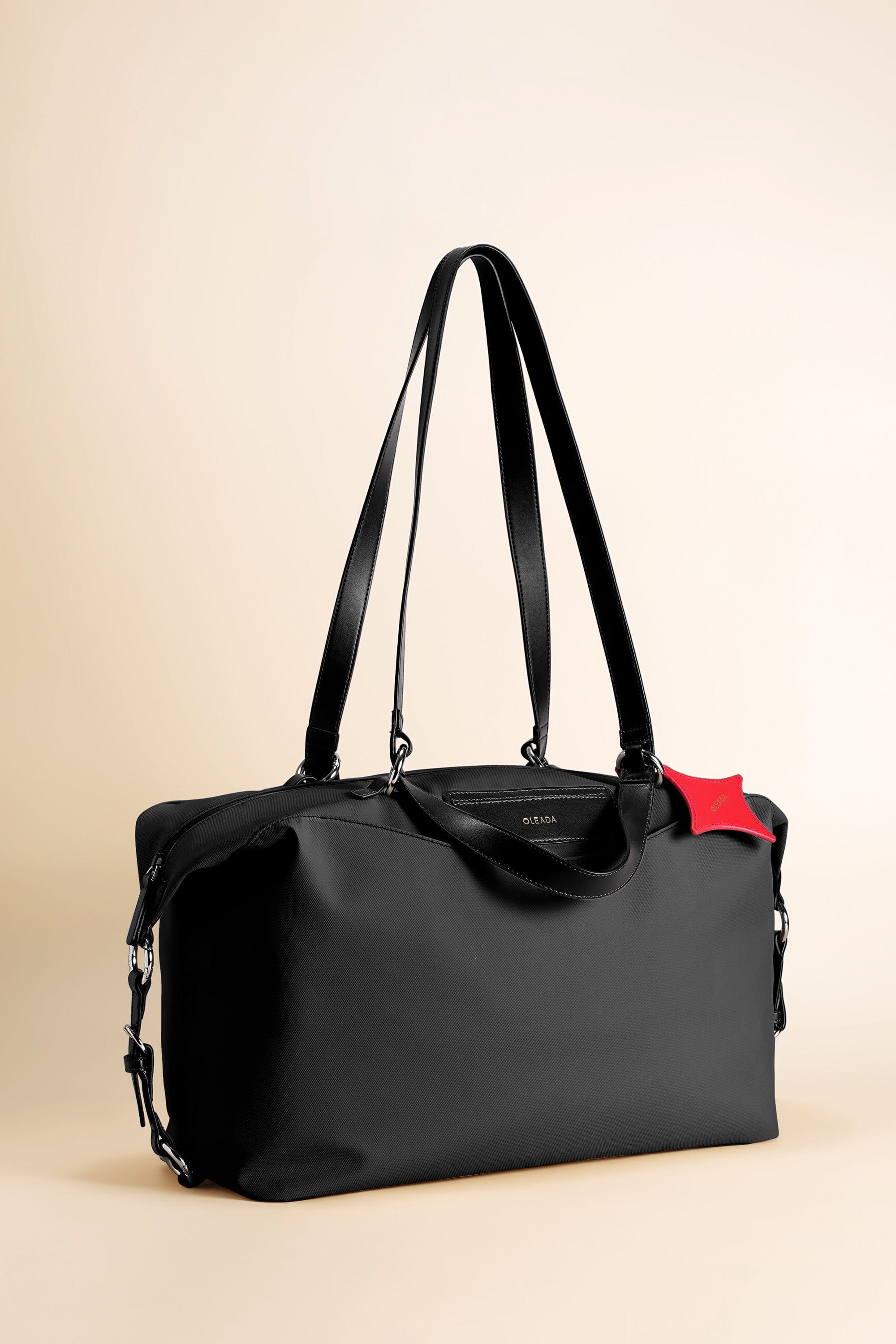 OLEADA NYC convertible travel bags > airport tote bags > overnight bags > water-resistant vegan bags > stylish multi-use bags AnyWear AnyDuffle Travel