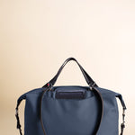 OLEADA NYC convertible travel bags > airport tote bags > overnight bags > water-resistant vegan bags > stylish multi-use bags AnyWear AnyDuffle Travel