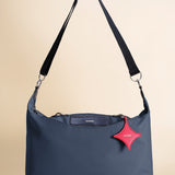 OLEADA NYC convertible travel bags > airport tote bags > overnight bags > water-resistant vegan bags > stylish multi-use bags AnyWear AnyDuffle Travel