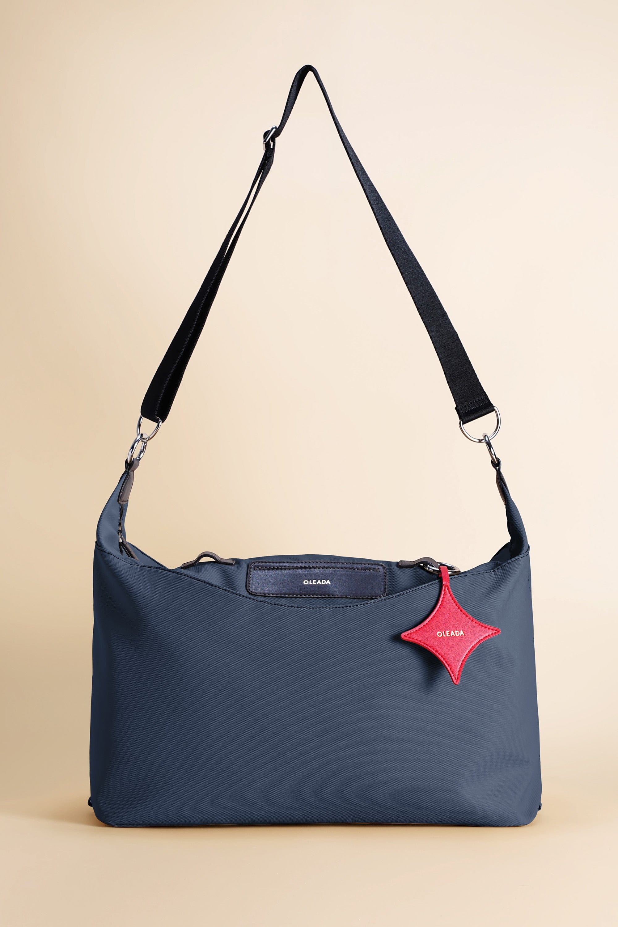 OLEADA NYC convertible travel bags > airport tote bags > overnight bags > water-resistant vegan bags > stylish multi-use bags AnyWear AnyDuffle Travel