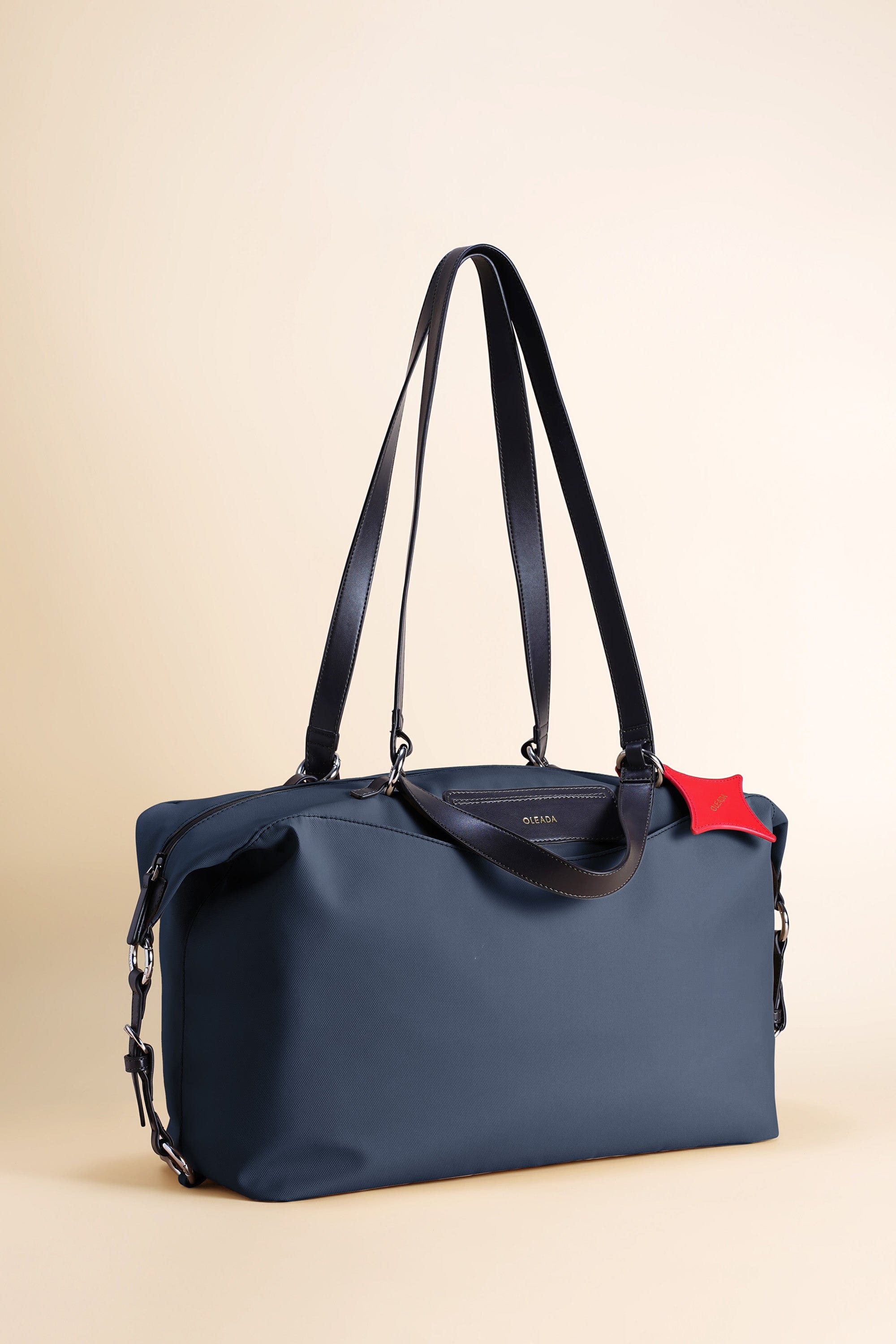 OLEADA NYC convertible travel bags > airport tote bags > overnight bags > water-resistant vegan bags > stylish multi-use bags AnyWear AnyDuffle Travel