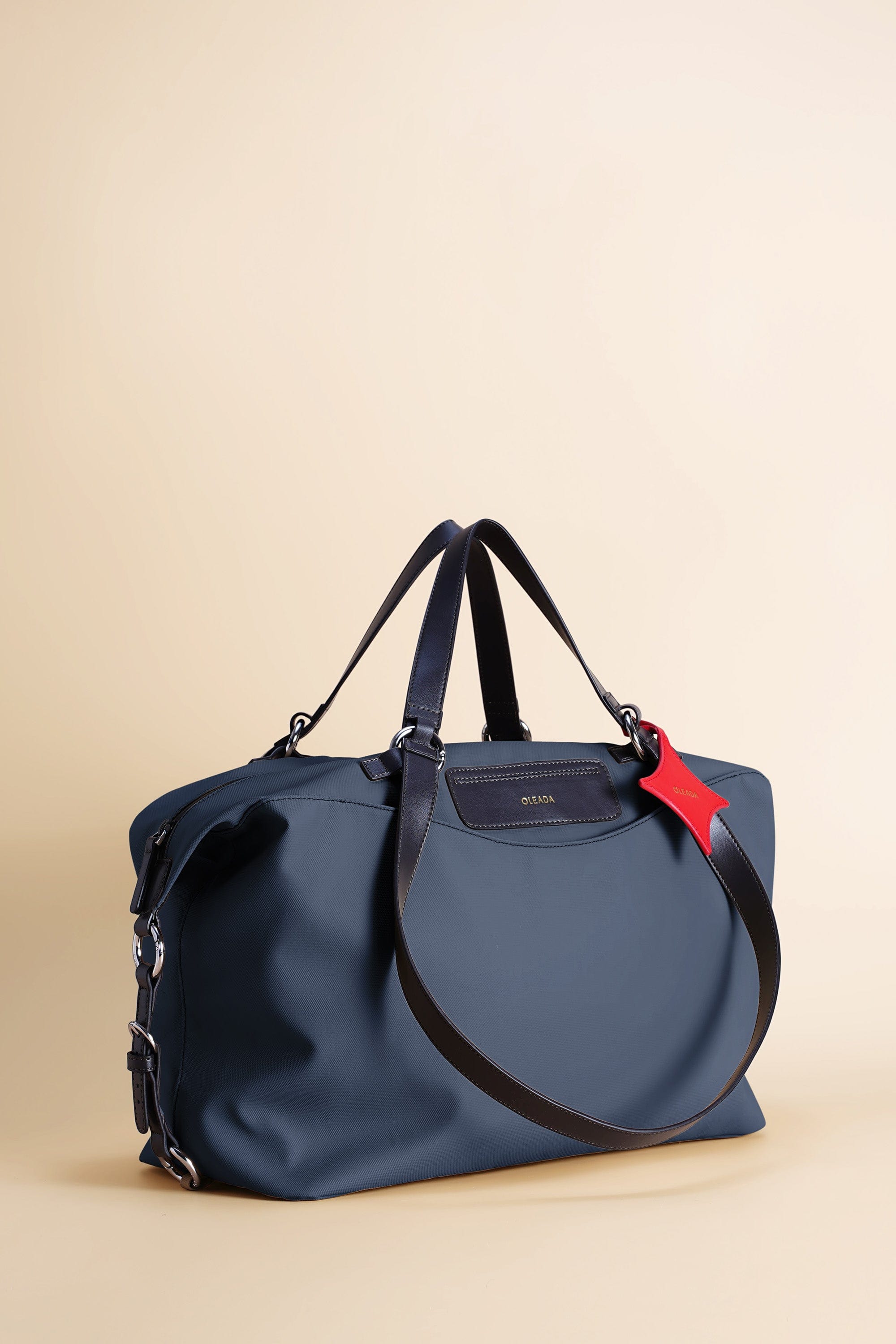 OLEADA NYC convertible travel bags > airport tote bags > overnight bags > water-resistant vegan bags > stylish multi-use bags AnyWear AnyDuffle Travel