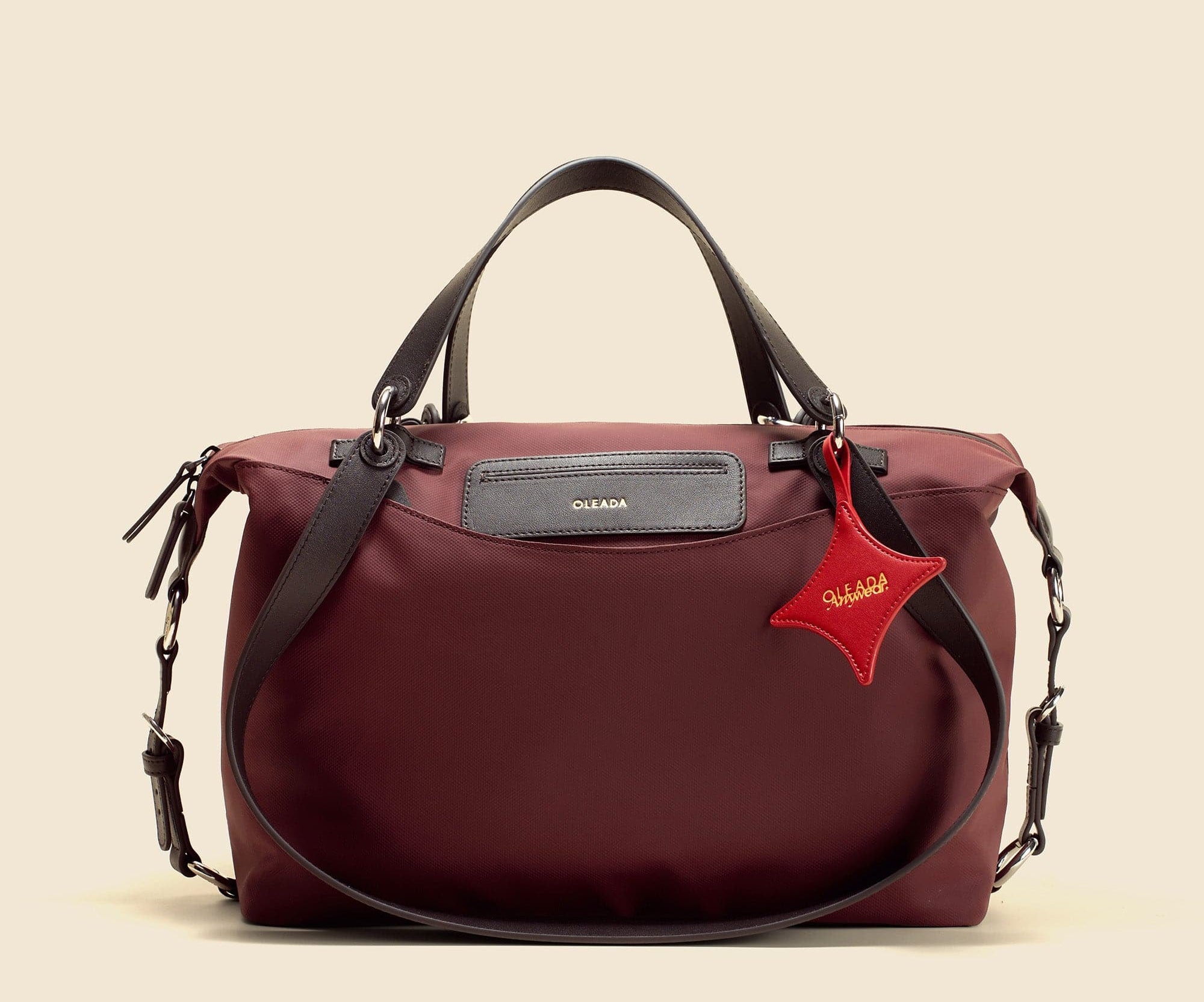 OLEADA NYC convertible travel bags > airport tote bags > overnight bags > water-resistant vegan bags > stylish multi-use bags Color_Bordeaux AnyWear AnyDuffle