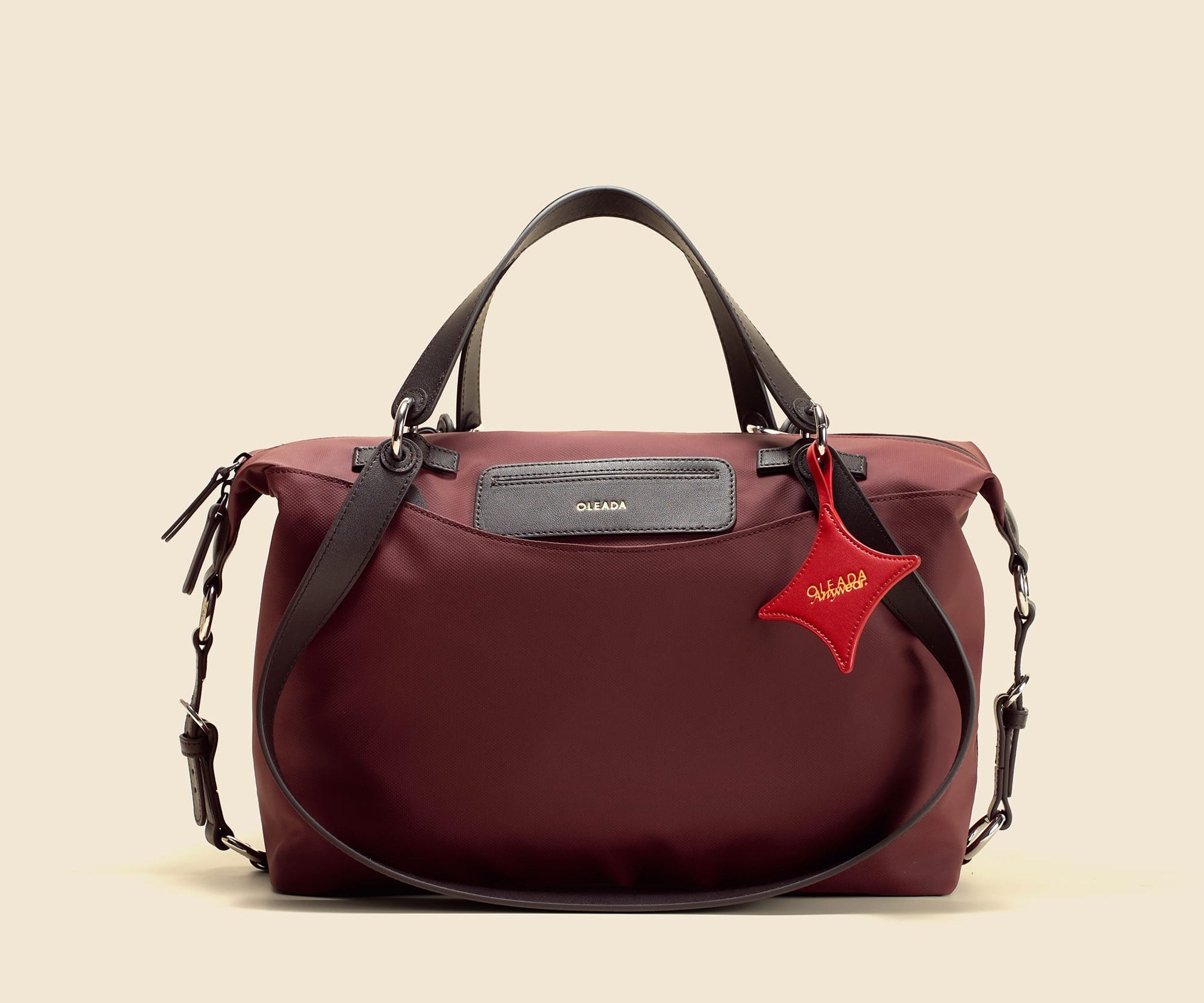 OLEADA NYC convertible travel bags > airport tote bags > overnight bags > water-resistant vegan bags > stylish multi-use bags Color_Bordeaux AnyWear AnyDuffle - City Size